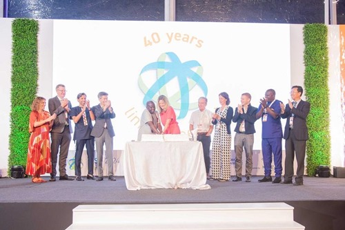 Cutting the anniversary cake: John Tanui and Lena Miranda with Board members and Konza Technopolis CEO